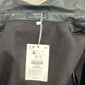 Leather black mini dress with buttons